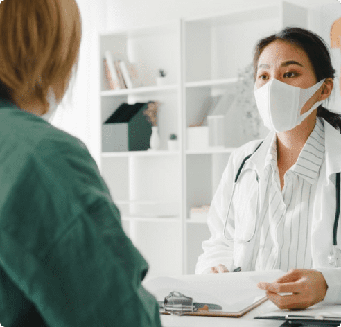 Barbiturate Addiction Treatment 10 doctor going over forms with patient