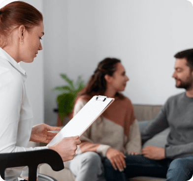 Barbiturate Addiction Treatment 13 therapist reading from clipboard