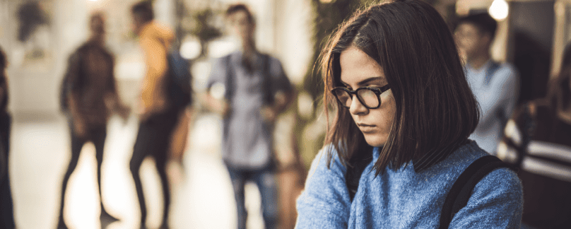 woman standing in front of group of people