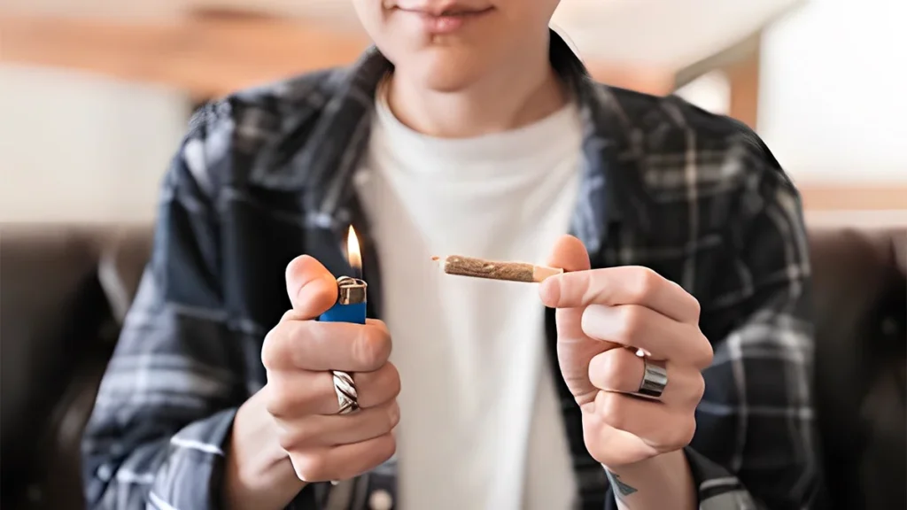 Understanding Triggers: Why Teens Turn to Drugs 7 Teen holding a cigarette and a lighter