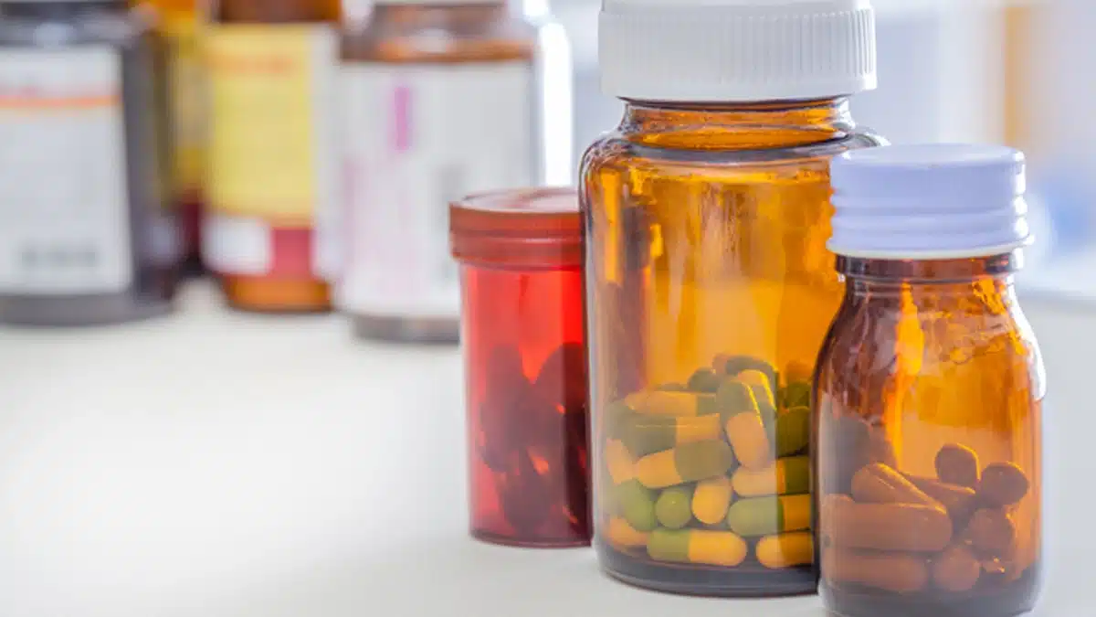 Pills in large apothecary jars.