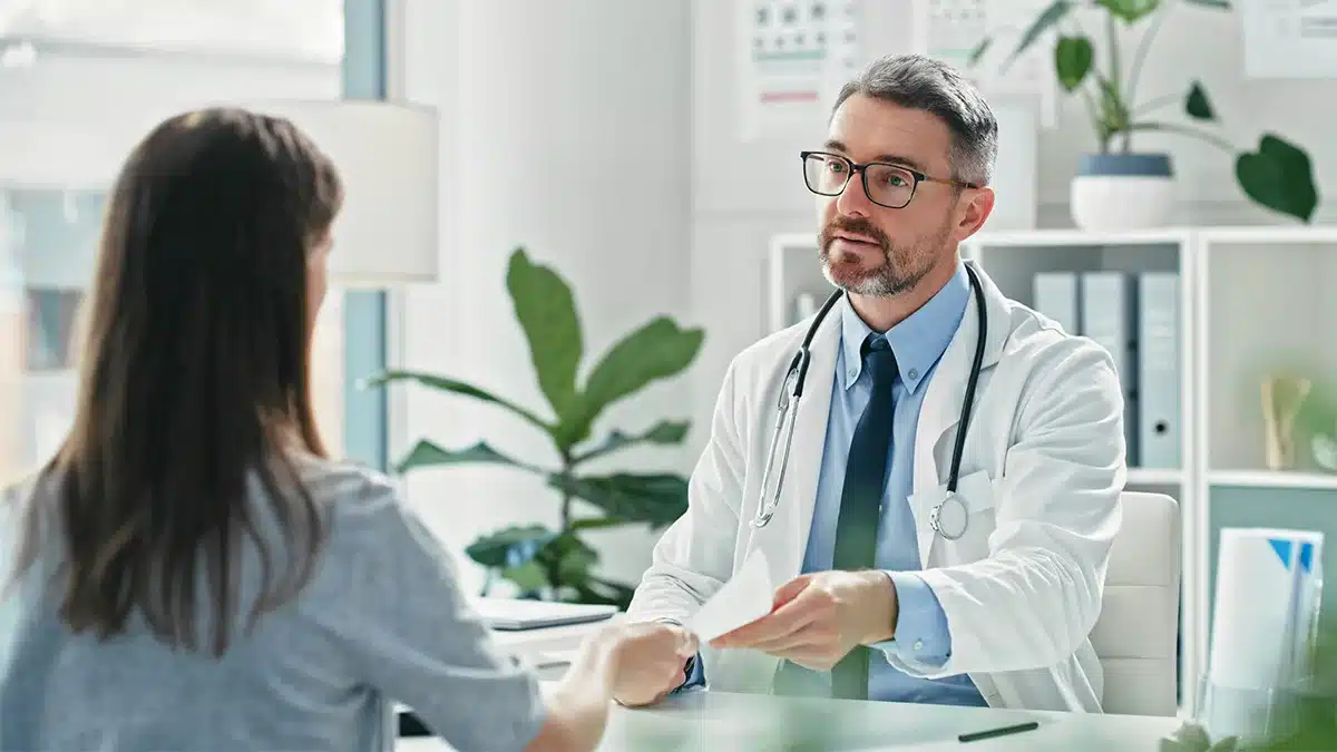 Doctor speaking with patient