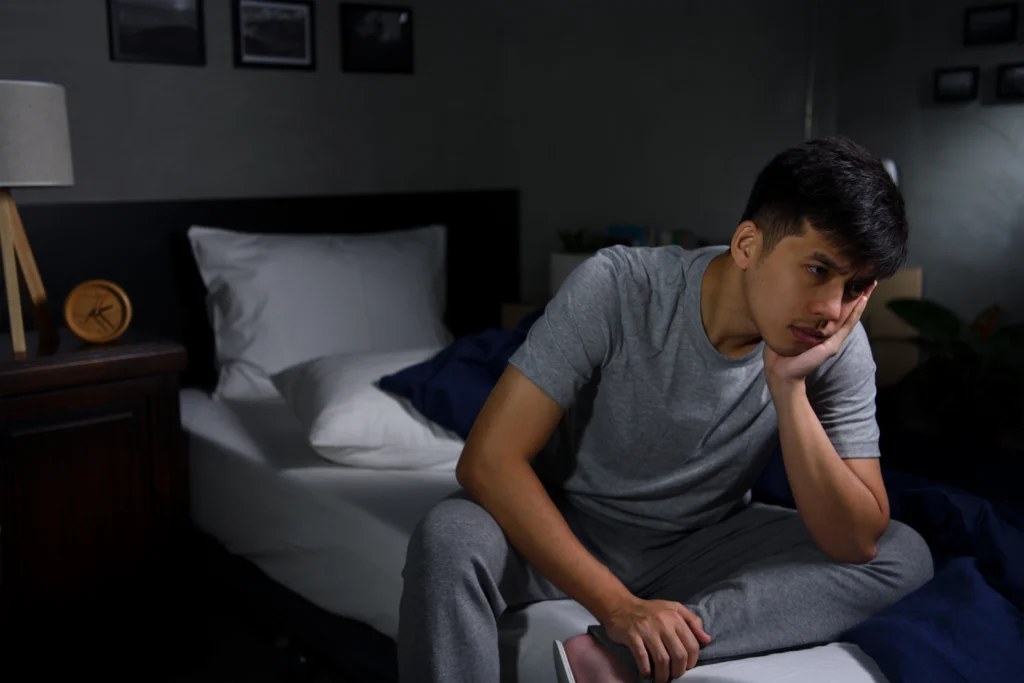 Coping Corner: Teen Strategies for Managing Anxiety 2 Teen boy sitting alone at night.